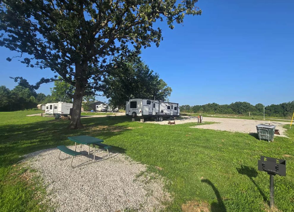 Spacious RV sites with shade trees and picnic tables at 4 Seasons RV Park in Mansfield, Missouri