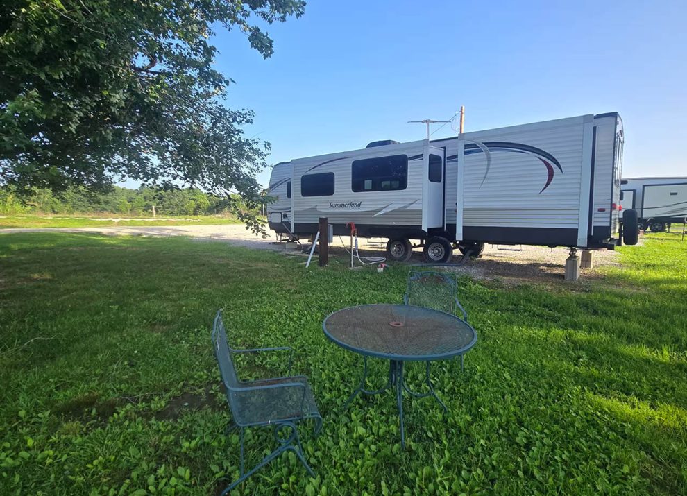Nelly's Nook vacation rental with outdoor seating at 4 Seasons RV Park in Mansfield, Missouri