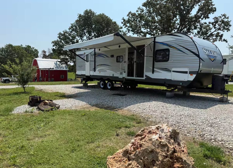 Randy’s Rest Stop camper and fire pit at 4 Seasons RV Park near Mansfield, Missouri